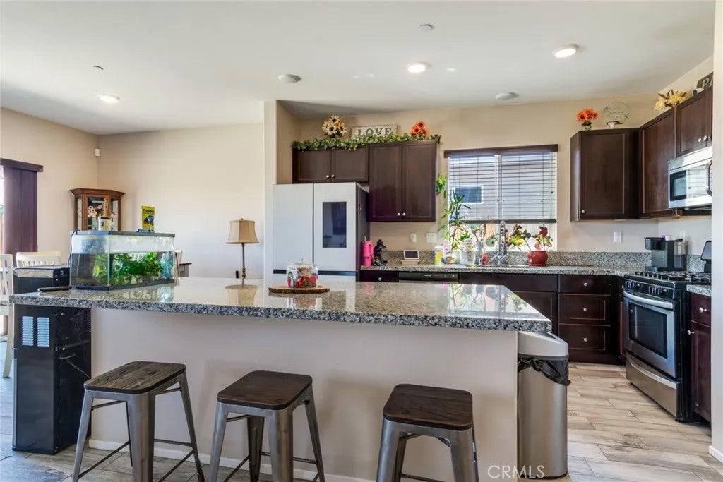 Photo of 11408 Poppy Road, Adelanto, CA 92301 (MLS # CV26170914)