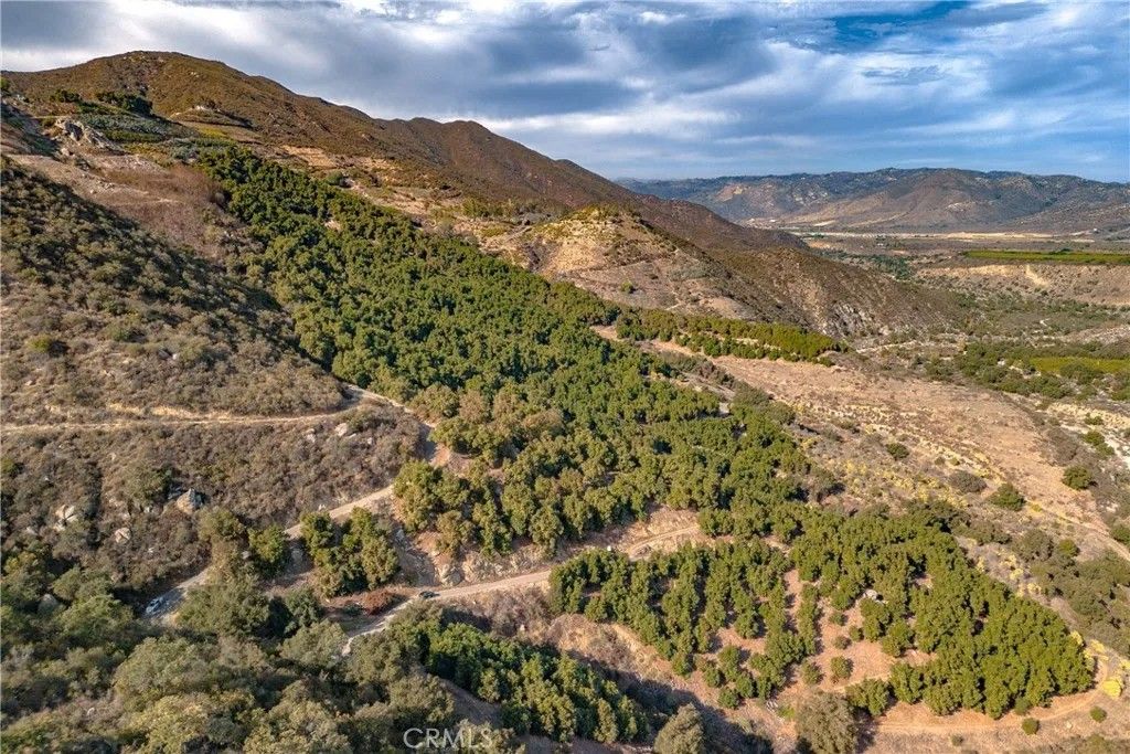 Photo of 48 Pauma Ridge, Valley Center, CA 92082 (MLS # SW25003233)