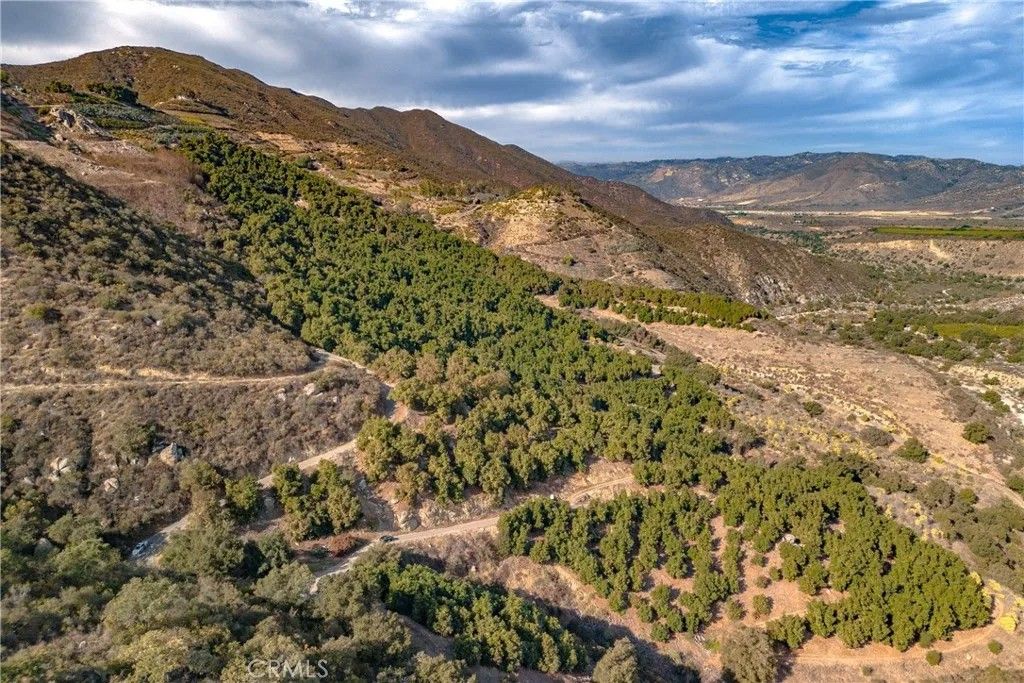 Photo of 48 Pauma Ridge, Valley Center, CA 92082 (MLS # SW25003233)