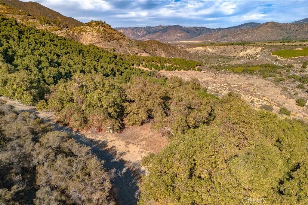 Photo of 48 Pauma Ridge, Valley Center, CA 92082 (MLS # SW25003233)