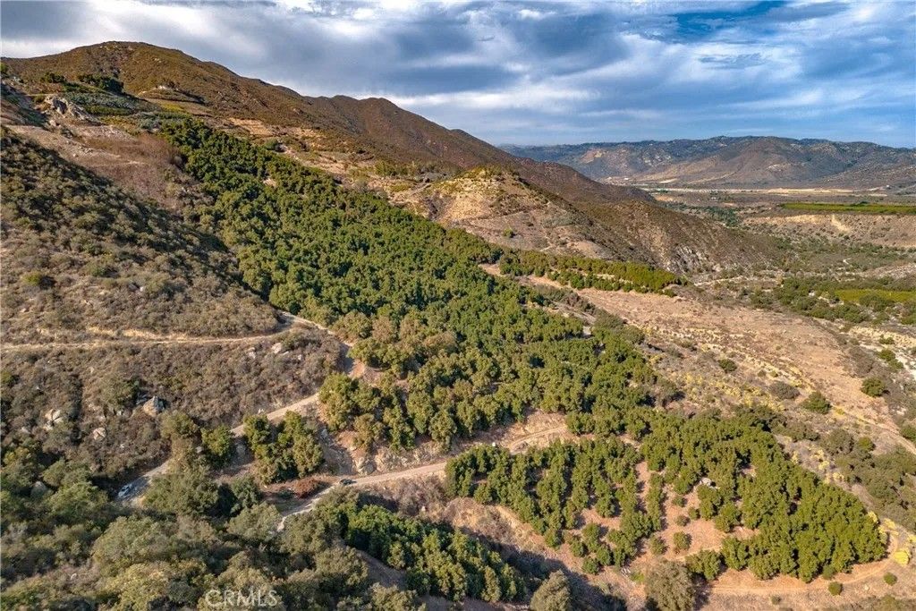 Photo of 48 Pauma Ridge, Valley Center, CA 92082 (MLS # SW25003233)