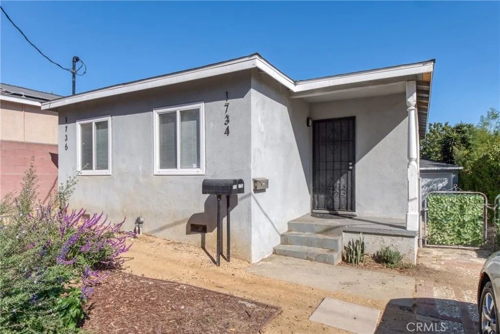 Photo of 1734 Eudora Avenue, Wilmington, CA 90744 (MLS # OC25267909)