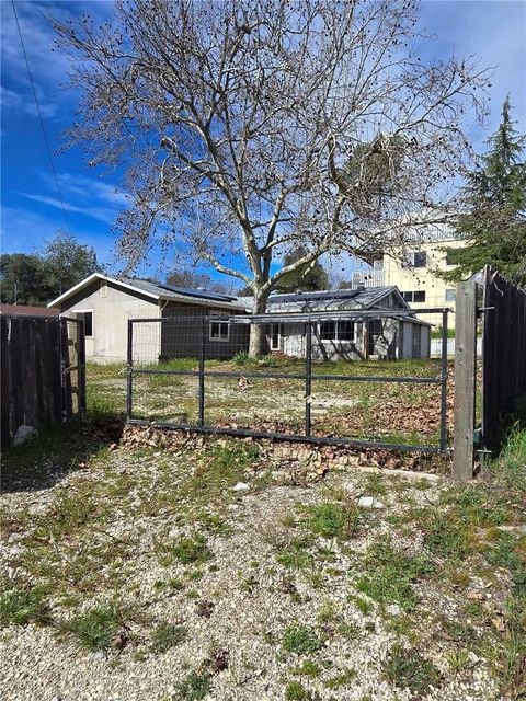 Photo of 13920 Manakee Ave, Clearlake, CA 95422 (MLS # LC26047077)
