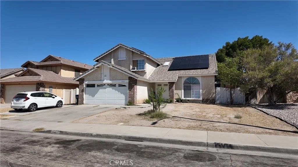 Photo of 2335 Langhorn St, Lancaster, CA 93535 (MLS # DW26061418)