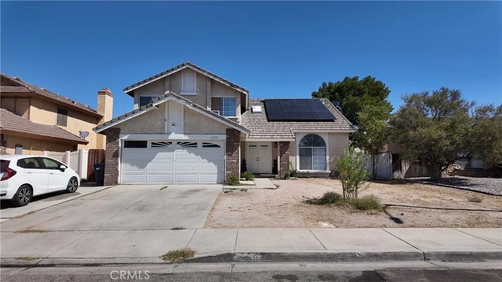 Photo of 2335 Langhorn St, Lancaster, CA 93535 (MLS # DW26061418)