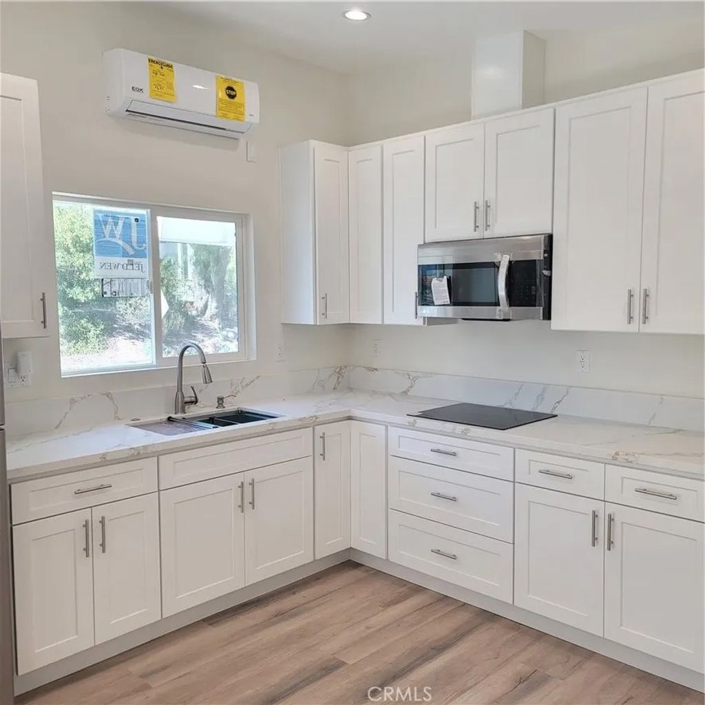 Photo of 5148 San Feliciano Drive, Woodland Hills, CA 91364 (MLS # SR26067720)