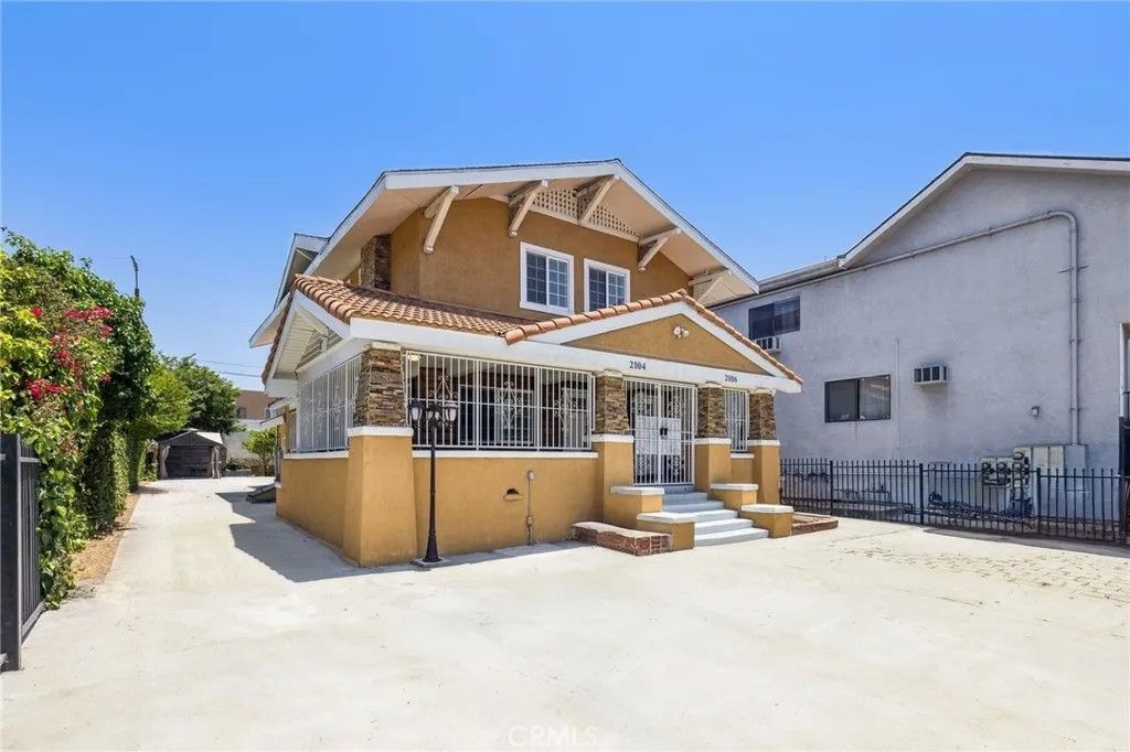 Photo of 2104 Crenshaw Boulevard, Los Angeles, CA 90016 (MLS # SB26030315)