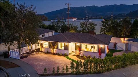 Photo of 6433 Creemore Lane, Tujunga, CA 91042 (MLS # GD26102617)