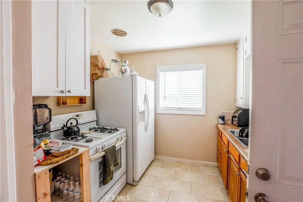 Photo of 12127 216th St, Hawaiian Gardens, CA 90716 (MLS # OC26075269)