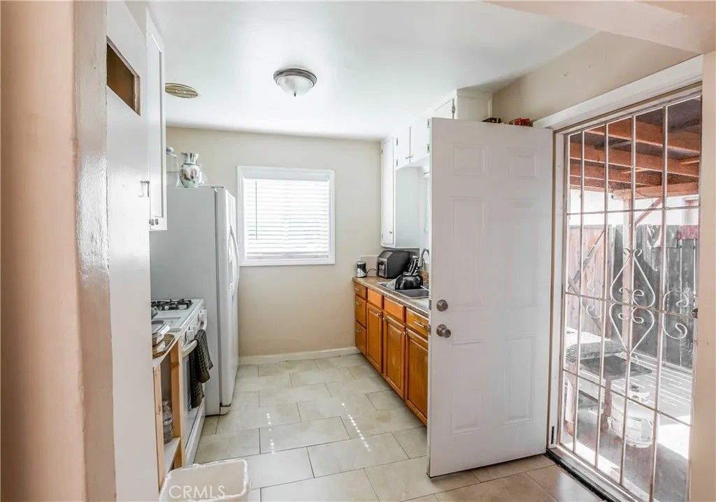 Photo of 12127 216th St, Hawaiian Gardens, CA 90716 (MLS # OC26075269)