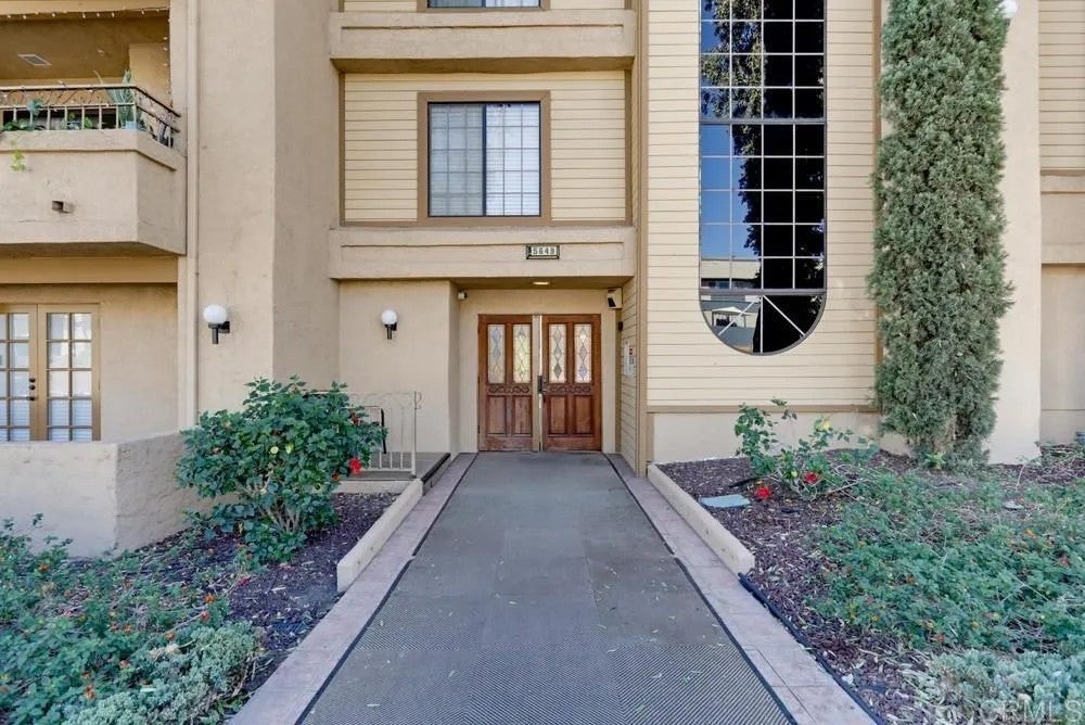 Photo of 5649 Lake Park Way #302, La Mesa, CA 91942 (MLS # PTP2607660)