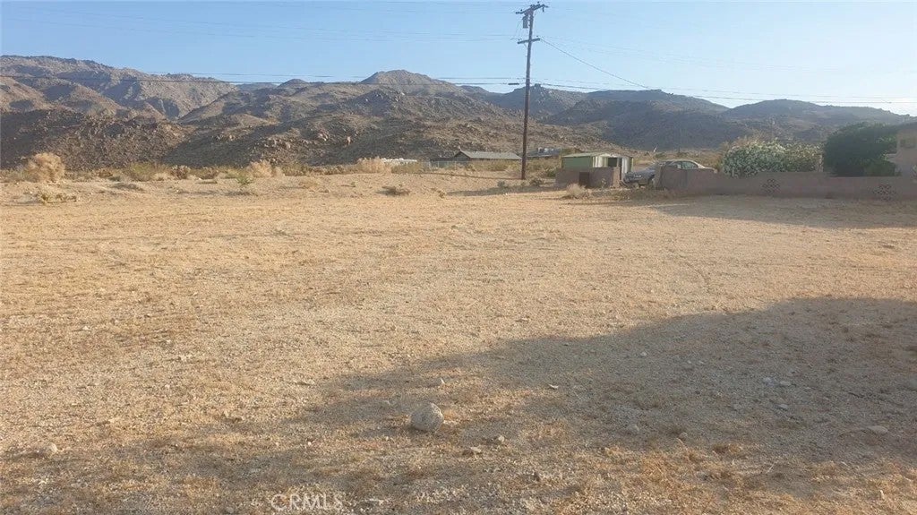 Photo of 71563 Juanita DR, 29 Palms, CA 92277 (MLS # OC26196839)