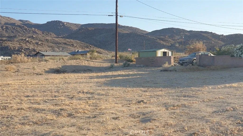 Photo of 71563 Juanita DR, 29 Palms, CA 92277 (MLS # OC26196839)