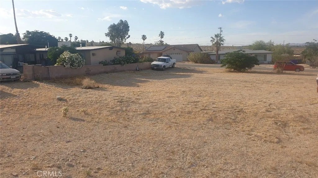 Photo of 71563 Juanita DR, 29 Palms, CA 92277 (MLS # OC26196839)
