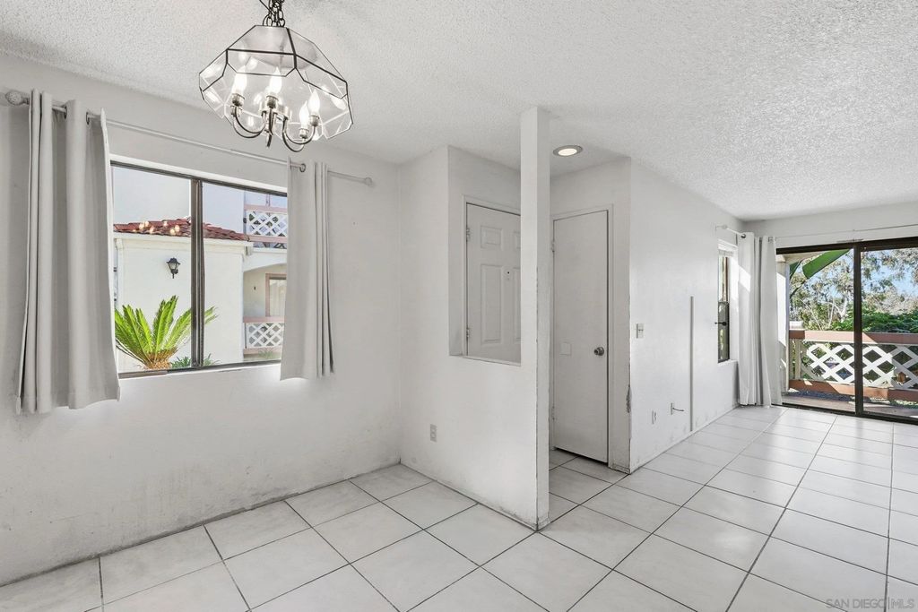 Photo of 9454 Twin Trails Dr #103, San Diego, CA 92129 (MLS # 260002809)