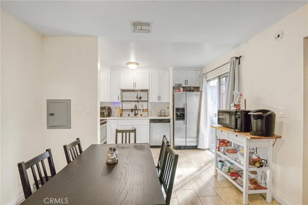 Photo of 7300 Lennox Avenue #J5, Van Nuys, CA 91405 (MLS # RS25250303)