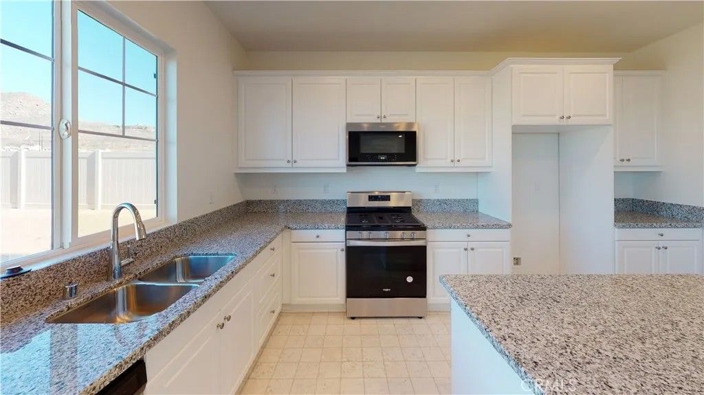 Photo of 21084 Telegraph Road, Riverside, CA 92507 (MLS # PW26025608)