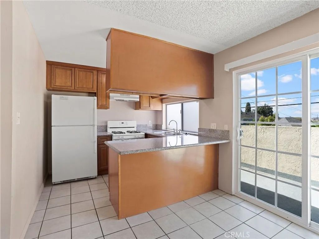 Photo of 7037 Milton Avenue #7, Whittier, CA 90602 (MLS # OC26041069)