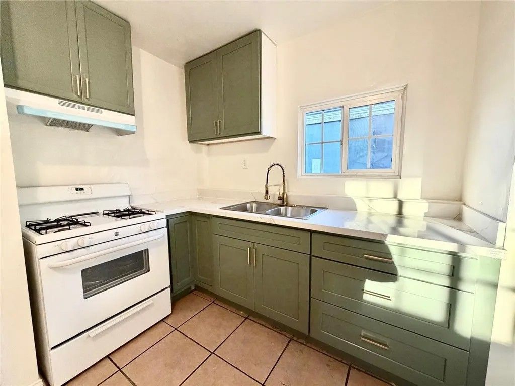 Photo of 890 E 4th St, Pomona, CA 91766 (MLS # TR25249007)