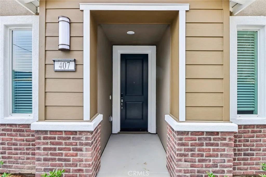 Photo of 407 Lotus Drive, San Marcos, CA 92069 (MLS # OC26114548)
