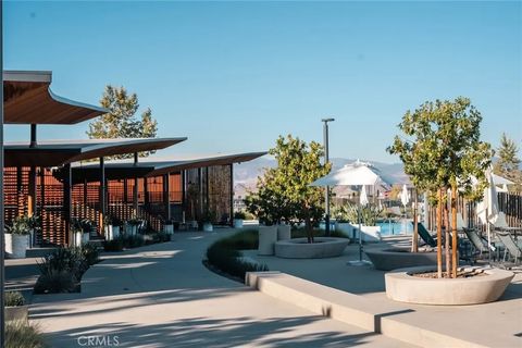 Tiny photo for 27410 N Merlin Place #101, Valencia, CA 91381 (MLS # PI25252894)