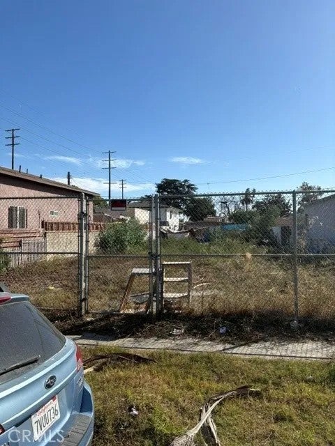 Photo of 854 E 87th Pl, Los Angeles, CA 90002 (MLS # SB26224166)