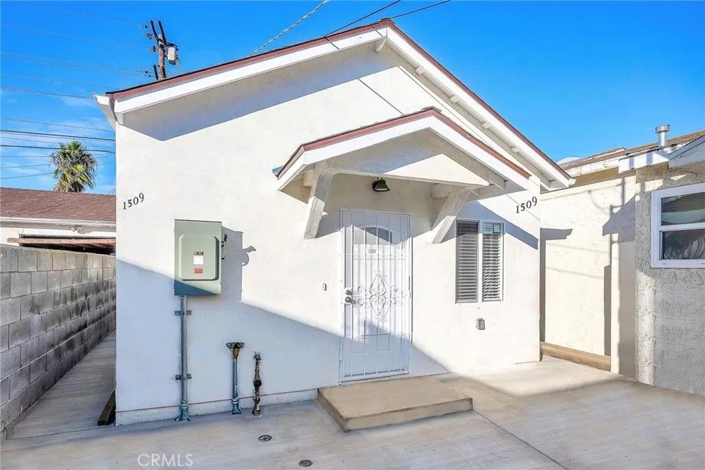 Photo of 1509 W 87th, Los Angeles, CA 90047 (MLS # SR25266950)