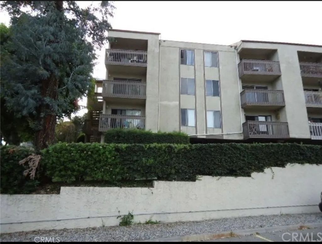 Photo of 1620 Neil Armstrong Street #203, Montebello, CA 90640 (MLS # SB26049513)
