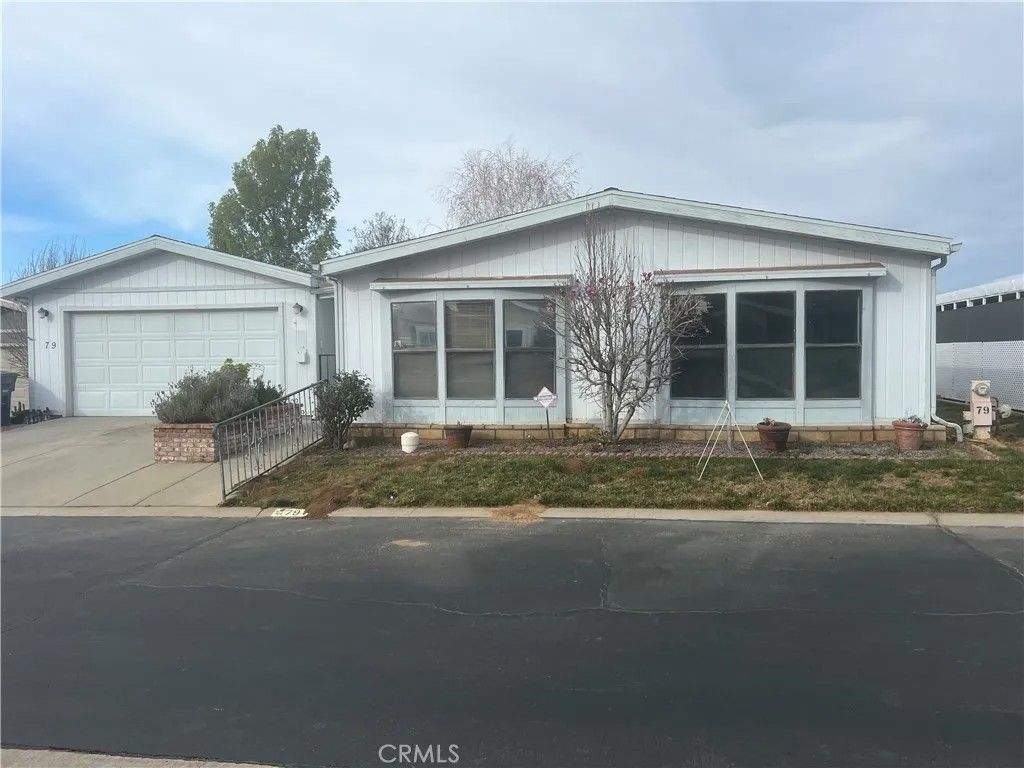 Photo of 10961 Desert Lawn Dr #79, Calimesa, CA 92320 (MLS # IG26031278)