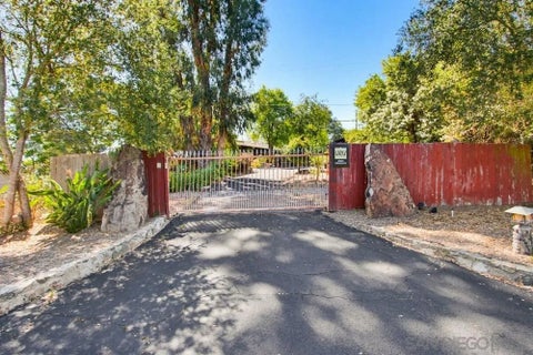 Photo of 28605 Rolling Rock Rd, Escondido, CA 92026 (MLS # 260017410)
