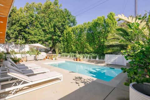Photo of 906 Adelante Avenue, Los Angeles, CA 90042 (MLS # P1-26411)