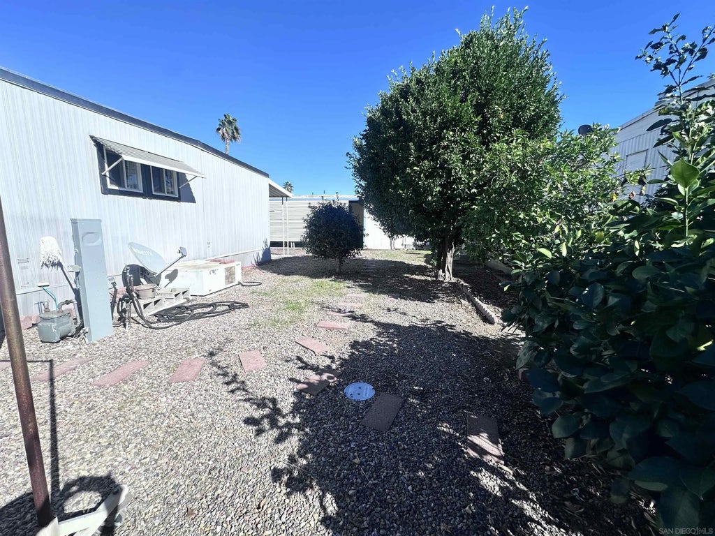 Photo of 8301 Mission Gorge Rd #50, Santee, CA 92071 (MLS # 260025674)