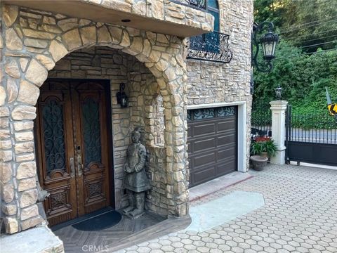 Photo of 1556 N Beverly Glen, Los Angeles, CA 90077 (MLS # PW26053965)