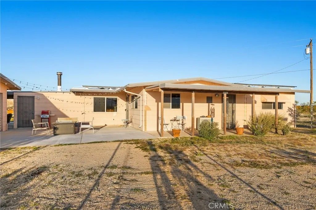Photo of 3910 Gayley Lane, 29 Palms, CA 92277 (MLS # JT26028648)