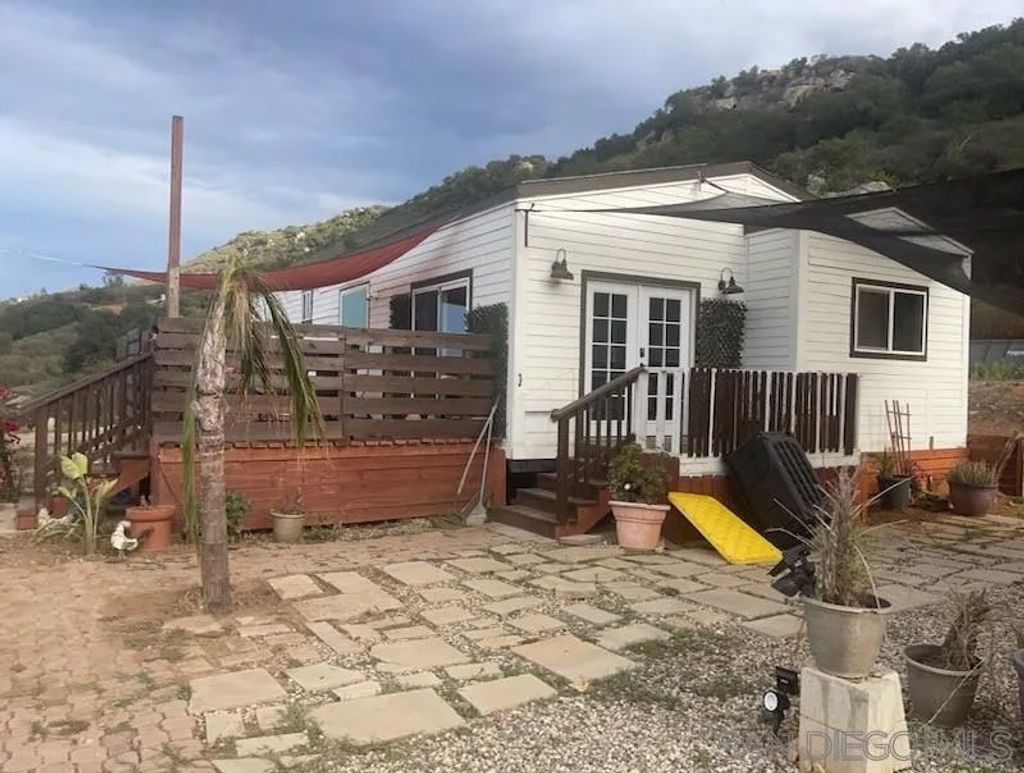 Photo of 14683 Woods Valley, Valley Center, CA 92082 (MLS # 250041483)