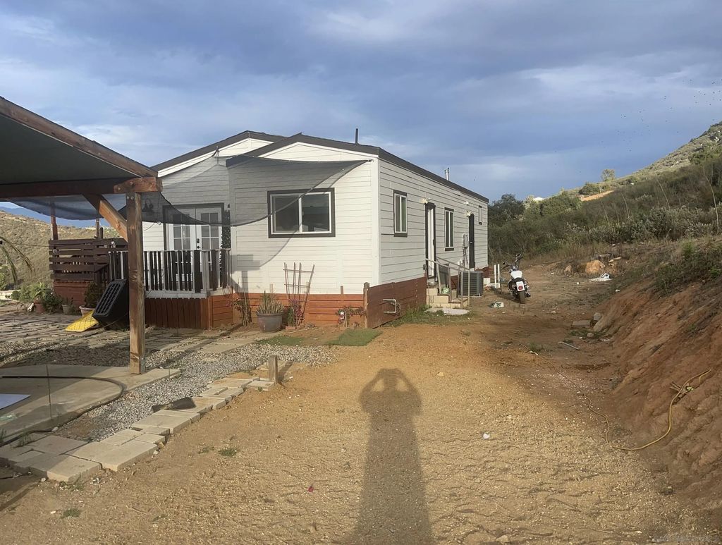 Photo of 14683 Woods Valley, Valley Center, CA 92082 (MLS # 250041483)