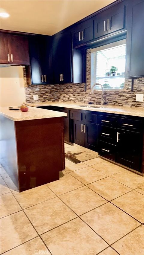 Tiny photo for 1046 W 123rd Street, County - Los Angeles, CA 90044 (MLS # SR25275520)