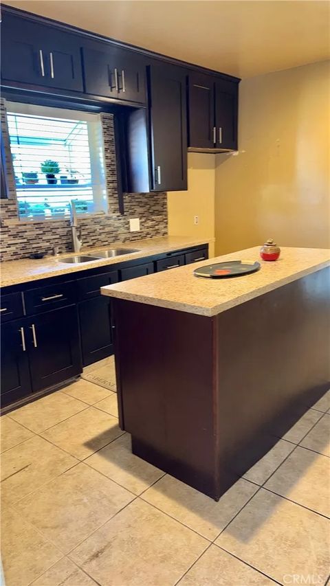 Tiny photo for 1046 W 123rd Street, County - Los Angeles, CA 90044 (MLS # SR25275520)