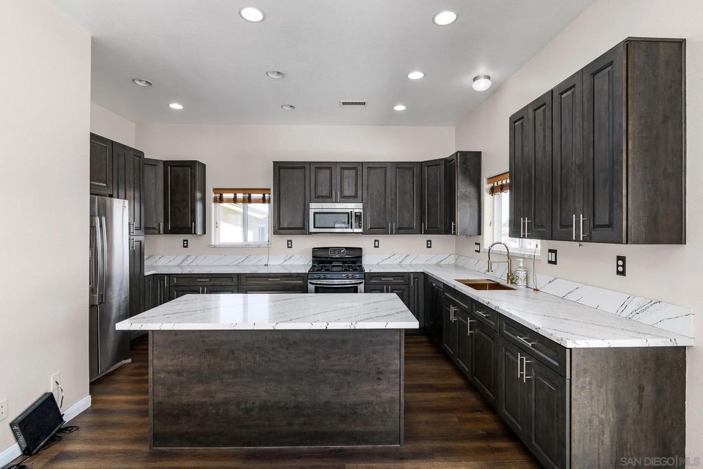 Photo of 4150 Marine View Ave, San Diego, CA 92113 (MLS # 260005979)