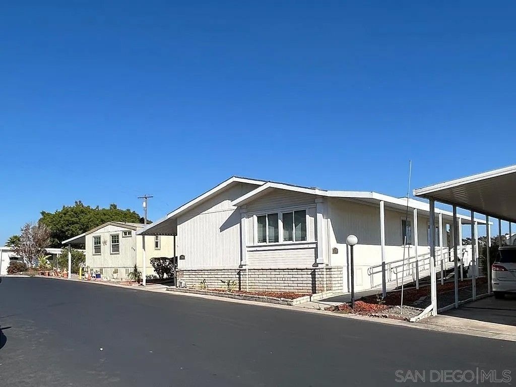 Photo of 2003 Bayview Heights Dr #238, San Diego, CA 92105 (MLS # 250041636)