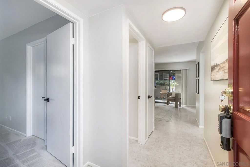 Photo of 1087 Shadowridge Dr #107, Vista, CA 92081 (MLS # 2600309)