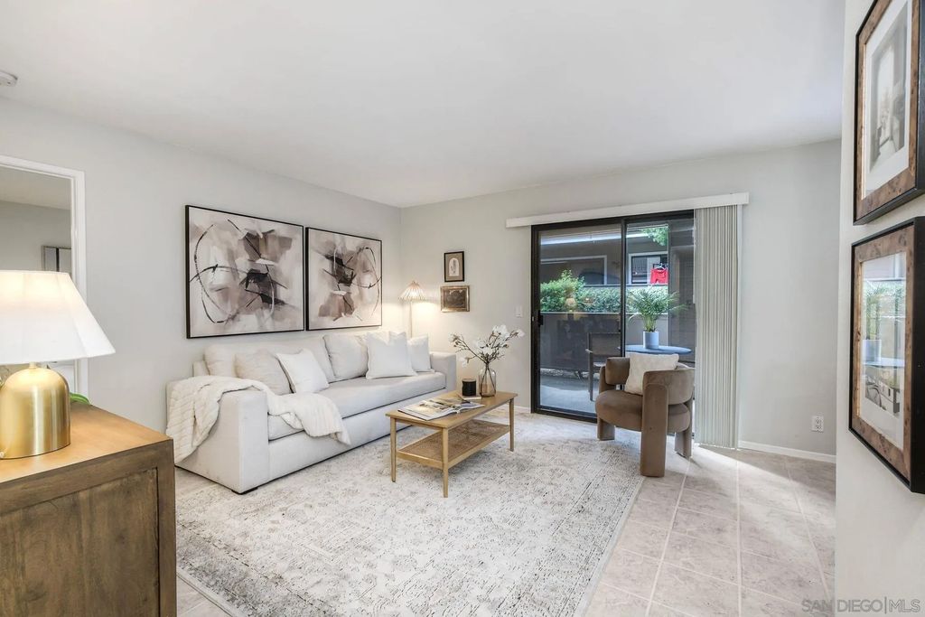 Photo of 1087 Shadowridge Dr #107, Vista, CA 92081 (MLS # 2600309)