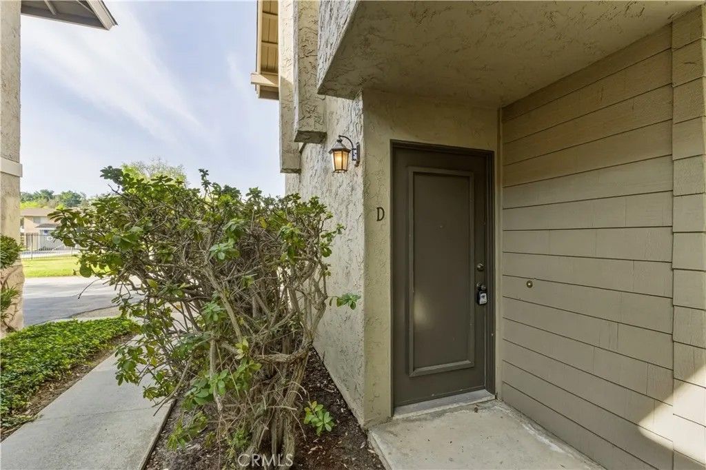 Photo of 995 Amistad Pl #D, El Cajon, CA 92019 (MLS # PW26013415)