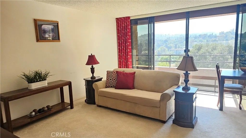 Photo of 24055 Paseo Del Lago #612, Laguna Woods, CA 92637 (MLS # OC26078089)