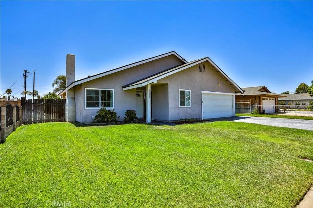 Photo of 23655 Suncrest Avenue, Moreno Valley, CA 92553 (MLS # IG26163862)
