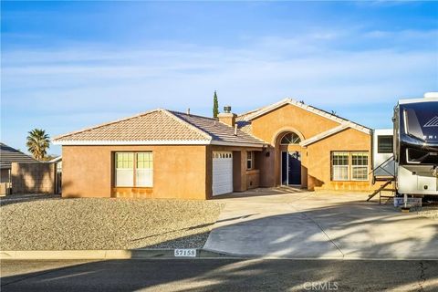 Photo of 57158 Selecta Ave, Yucca Valley, CA 92284 (MLS # JT25278794)