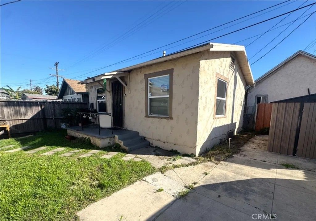 Photo of 150 E 70th Street, Los Angeles, CA 90003 (MLS # CV26045771)