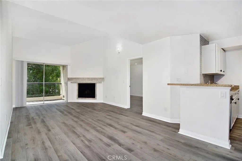 Photo of 21500 Burbank Boulevard #307, Woodland Hills, CA 91367 (MLS # SR26095590)