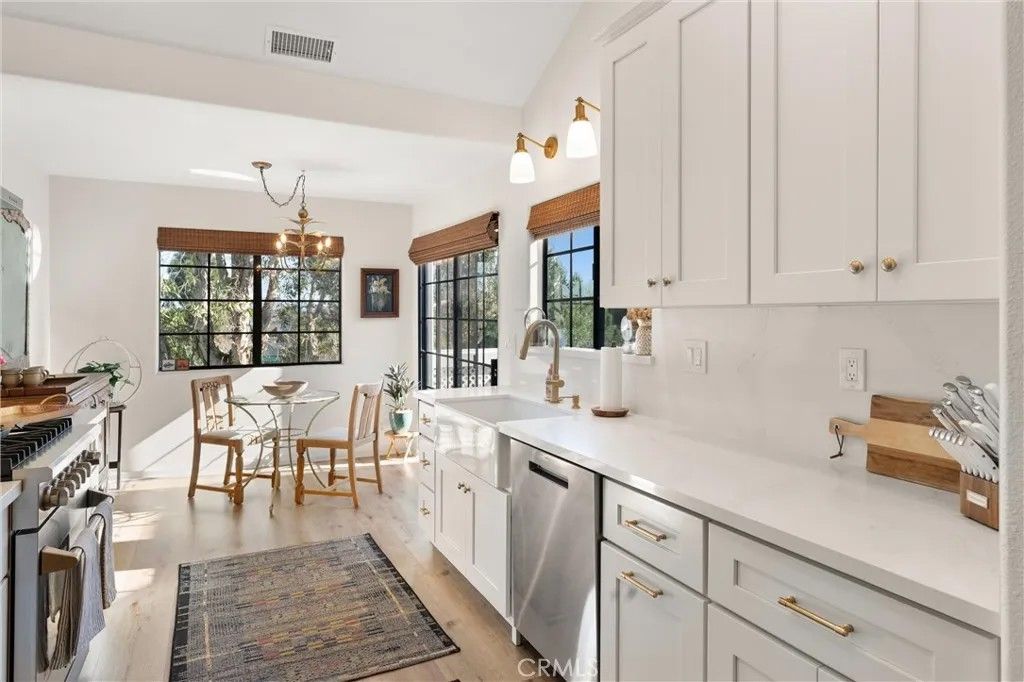 Photo of 20212 Sealargo Lane #203, Huntington Beach, CA 92646 (MLS # OC26006686)