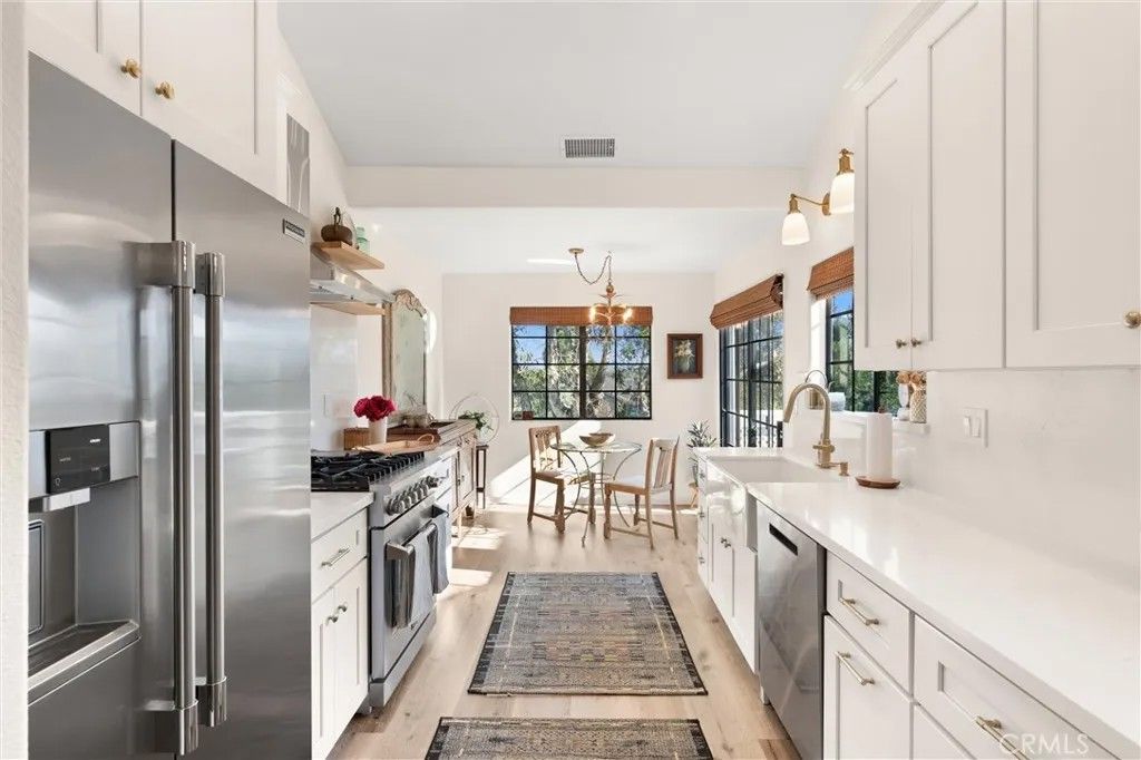 Photo of 20212 Sealargo Lane #203, Huntington Beach, CA 92646 (MLS # OC26006686)